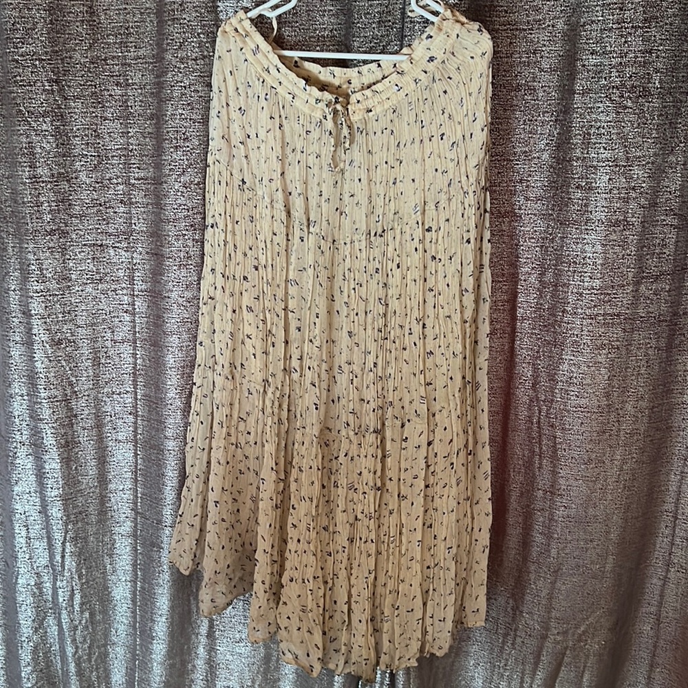 Beautiful adjustable cream colored blue flower print long skirt!